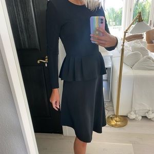 Asymmetric peplum black midi dress